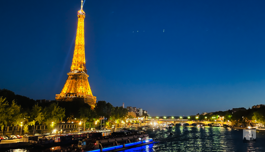 Romantic view over the Seine, the illuminated Eiffel Tower and Pont d’Iéna. Romantic view over the Seine, the illuminated Eiffel Tower and Pont d’Iéna.